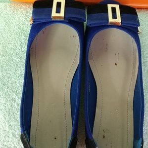 Blue and black bare feet shoes